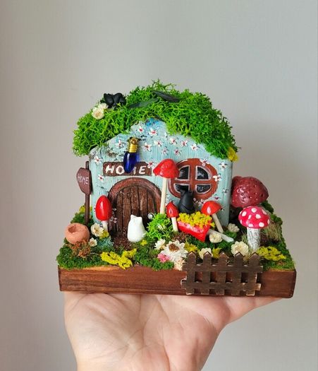 handcrafted fairy cottage with moss roof!