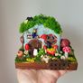 handcrafted fairy cottage with moss roof! Image 3