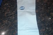 Boy's Nautica cream chino trousers. Age 10