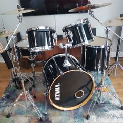 Tama 5-piece black Drum Kit with Zildjian cymbals and drum cases.