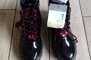 girls Disney boots size by 1....light up soles