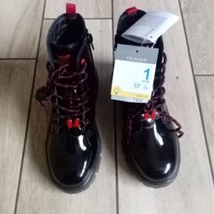 girls Disney boots size by 1....light up soles