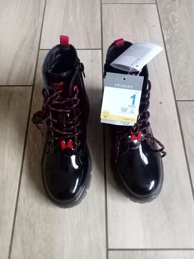girls Disney boots size by 1....light up soles
