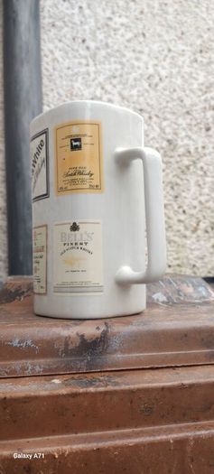 Scotch whiskey advertising jug, unusual with 4 brands on it ,nice to any collectors collection, lovely display item, price includes post to anywhere in Ireland thank you, sold as is