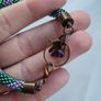 Handmade beaded rope and copper bracelet. purple and green Image 4