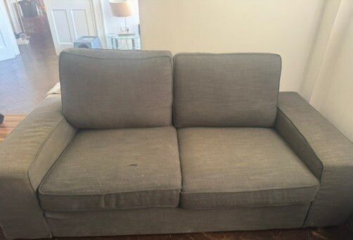 Three-seater fabric sofa