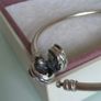 Pandora Moments encircled clasp bangle openwork swirl clasp holding a sparkling center crystal in great condition Image 9
