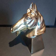 Large ceramic horse head statue