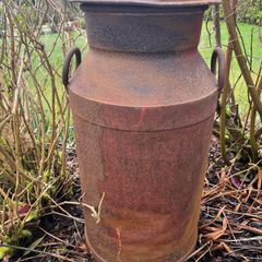 Vintage rustic creamery can
