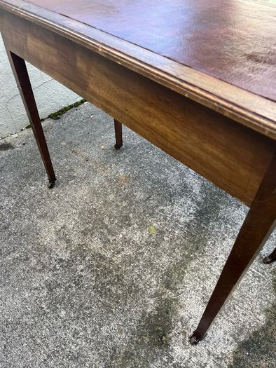 Maghoney wine leather desk with 2 drawers. Inlaid
