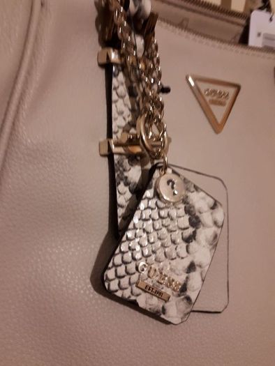 new genuine guess bag tag attached