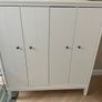 Ikea White storage cabinet Idanas with bi-folding doors Image 2