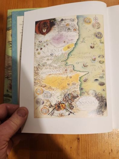 The Chronicals Of Narnia Compilation.  2 Books In Presentation Folder. Large Volume Hardback In Very Good Condition.