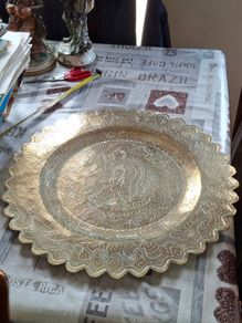 A Decorative Antique Large Hand-Engraved Chinese Dragon Brass Tray, featuring intricate hand-engraved dragon motifs and hand-chased patterns around the edges
