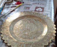 A Decorative Antique Large Hand-Engraved Chinese Dragon Brass Tray, featuring intricate hand-engraved dragon motifs and hand-chased patterns around the edges