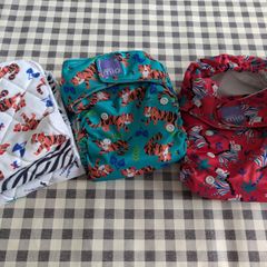 Reusable nappies and liners