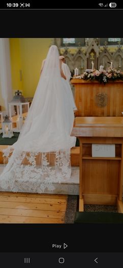 Beautiful cathedral length veil with flower and subtle sparkle detail