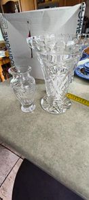 Is  2 crystal Vases-  Antique American Brilliant Cut Glass Trumpet Vase     8 and 1/2 inches tall 65.00 euro.-- the other one 6 inches Flower Vase Pompeii Collection by Waterford Crystal 32.00 euro.