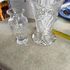 Is  2 crystal Vases-  Antique American Brilliant Cut Glass Trumpet Vase     8 and 1/2 inches tall 65.00 euro.-- the other one 6 inches Flower Vase Pompeii Collection by Waterford Crystal 32.00 euro.