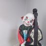 Vintage Clown Playing Bass Cello Image 2