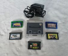 Nintendo Game Boy Advance SP -SNES Edition Shell + Games