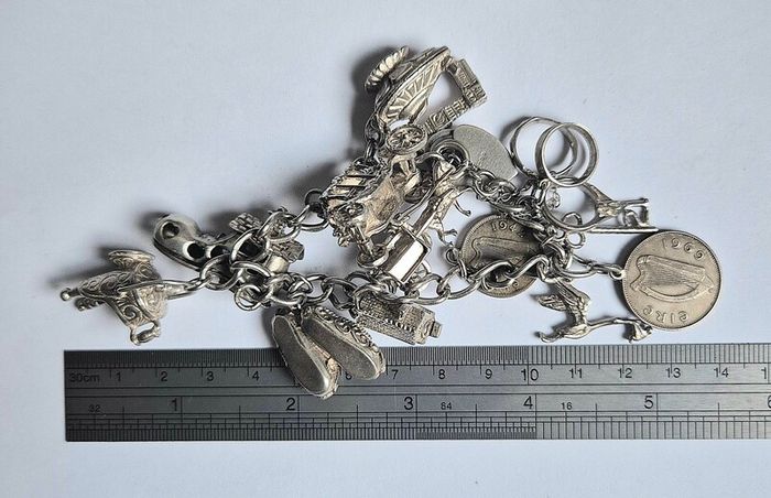 Vintage Irish Sterling Silver 14pc Charm Bracelet, Thomas O'Connor Charm Maker. Inc 1942 Pre Decimal Threepence, Dated Heart Padlock, Dublin Hallmarked