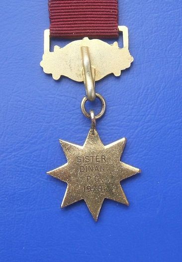 ORDER OF THE LADIES GLADE (OLG) - PRIMA degree White Rose member's medal (1978). Inscribed with recipient's name. A scarce medal.