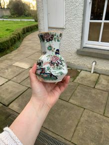 small ceramic vase