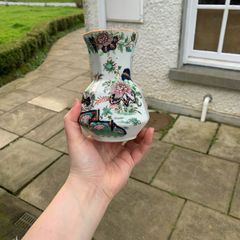 small ceramic vase