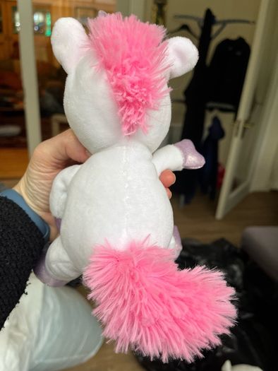 Cuddly white and pink unicorn