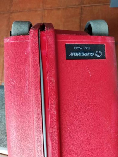 Red hard-shell suitcase