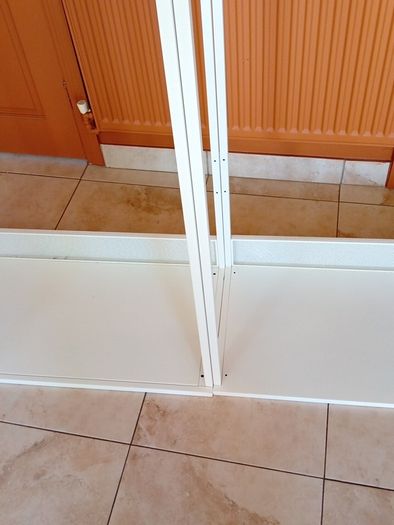 Two open wardrobe hanging rails Ikea Platsa