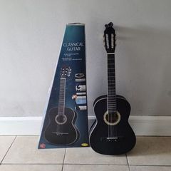 Classic guitar (never used) + bag + tuner for sale