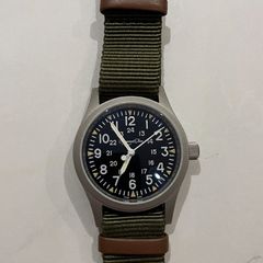 Escapement time field watch