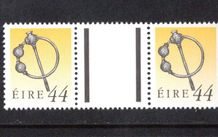 1990-91 Ireland 44p Silver Thistle Brooch Seventh Definitive Stamp Treasures Series of Ireland Gutter Pair Mint Never Hinged (MNH)