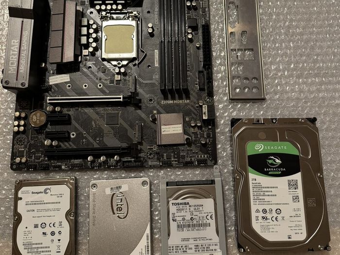 Motherboard and hard drives - FAULTY
