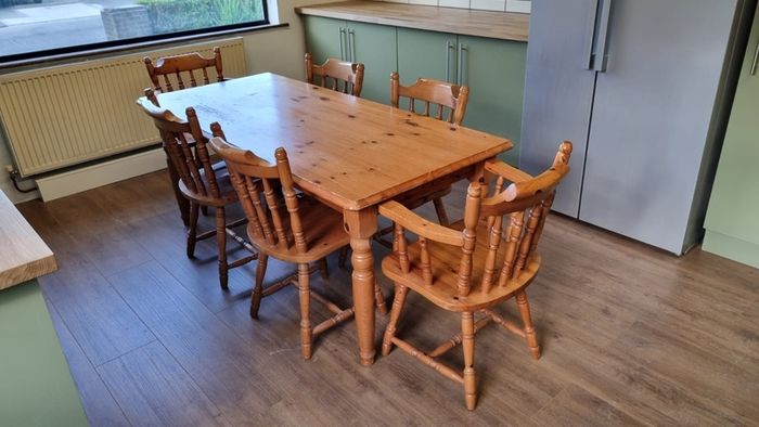 Soid Pine kitchen table and 6 chairs, 2 are 'Carvers' (with arms) and 4 are standard.