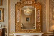 Very grand and decorative mirror that could be located in many opulent scenarios