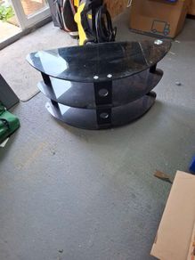 Black glass TV stand.