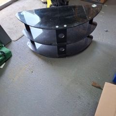 Black glass TV stand.