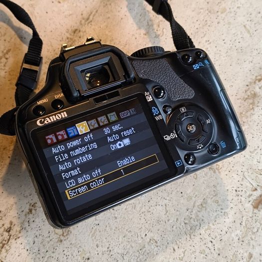 Canon 450D + Official battery