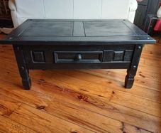 black coffee table with drawer