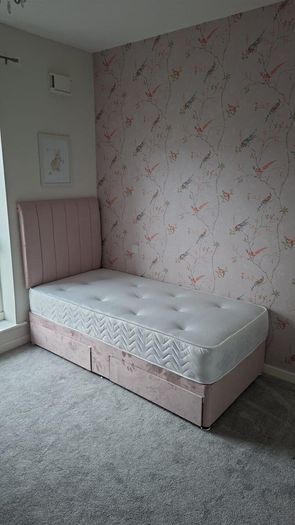 Single beds, cream, pink and navy blue