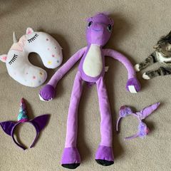 Wearable unicorn plush with unicorn themed accessories