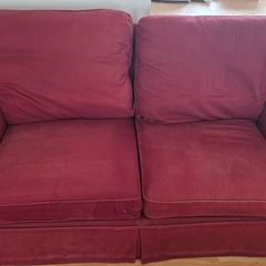 Living room / lounge couch in dark burgundy red