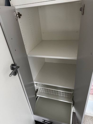 Bed with wardrobe and desk