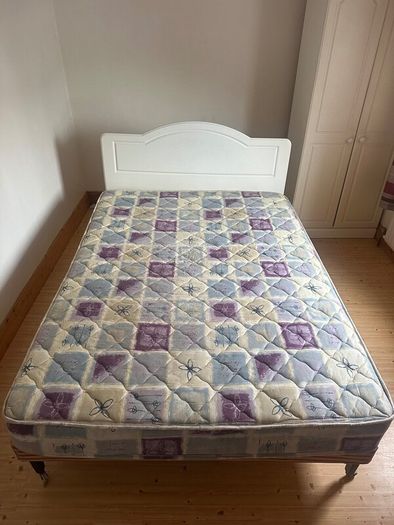 Double Bed with white headboard