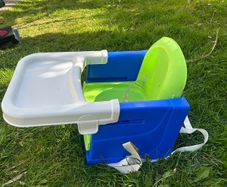 Portable travel chair for baby - toes on to standard chair