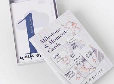 Bow and rattle baby buggy and Milestone Cards liquidation stock
