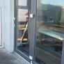 Large white bifold pvc door ,grey wrap on outside Image 4